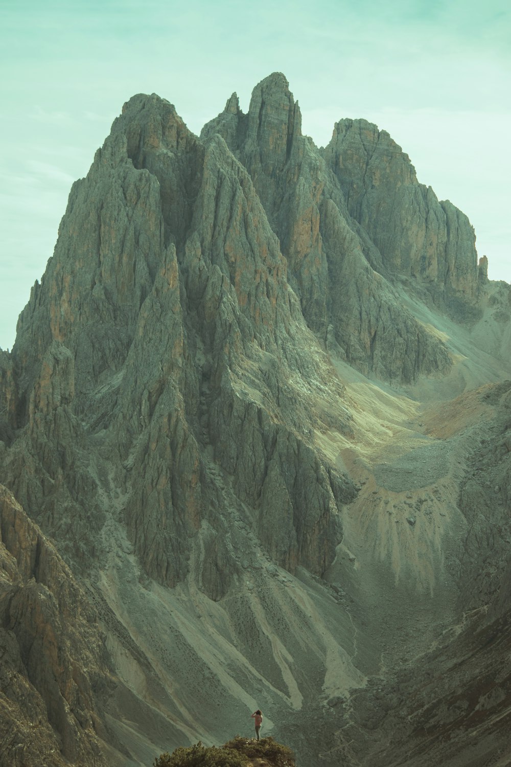 a person standing on top of a mountain