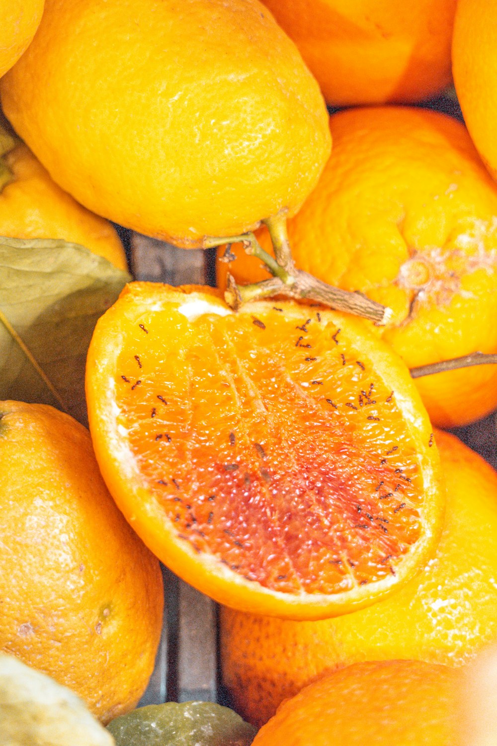 a pile of oranges sitting next to each other