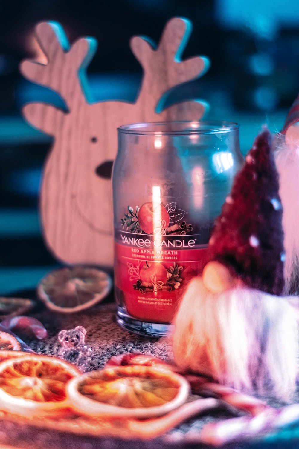 a candle and some food on a table