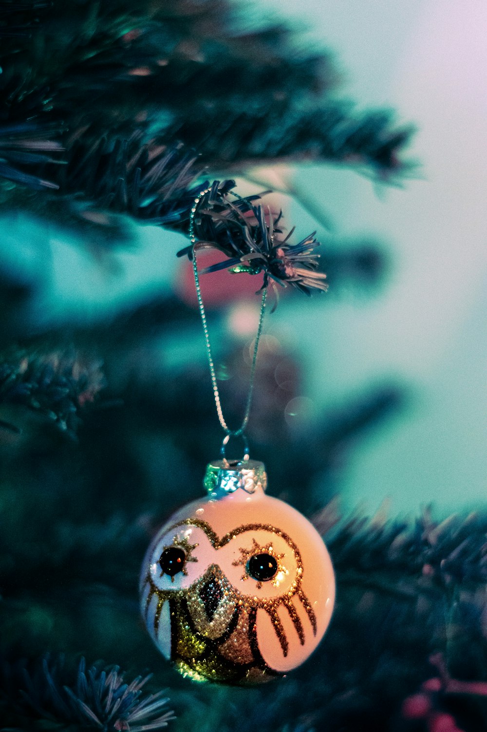 an ornament hanging from a christmas tree