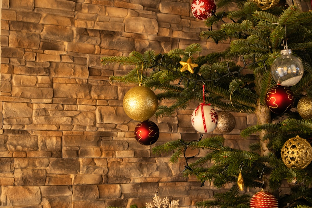 a christmas tree with ornaments hanging from it