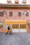 A woman walking confidently in fashionable footwear.