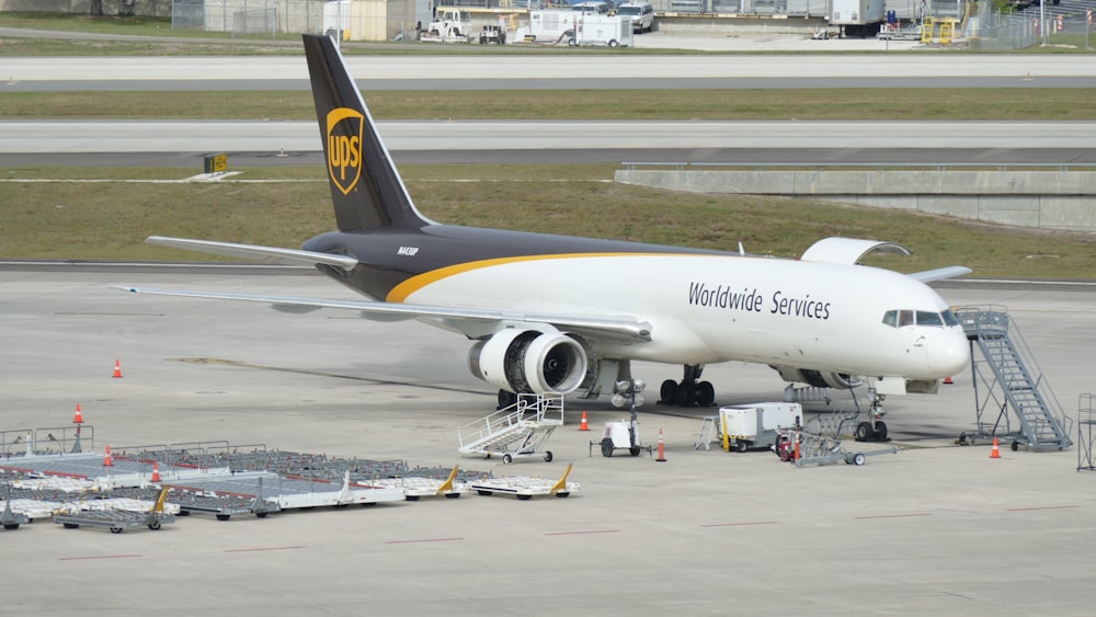 a large jetliner sitting on top of an airport tarmac