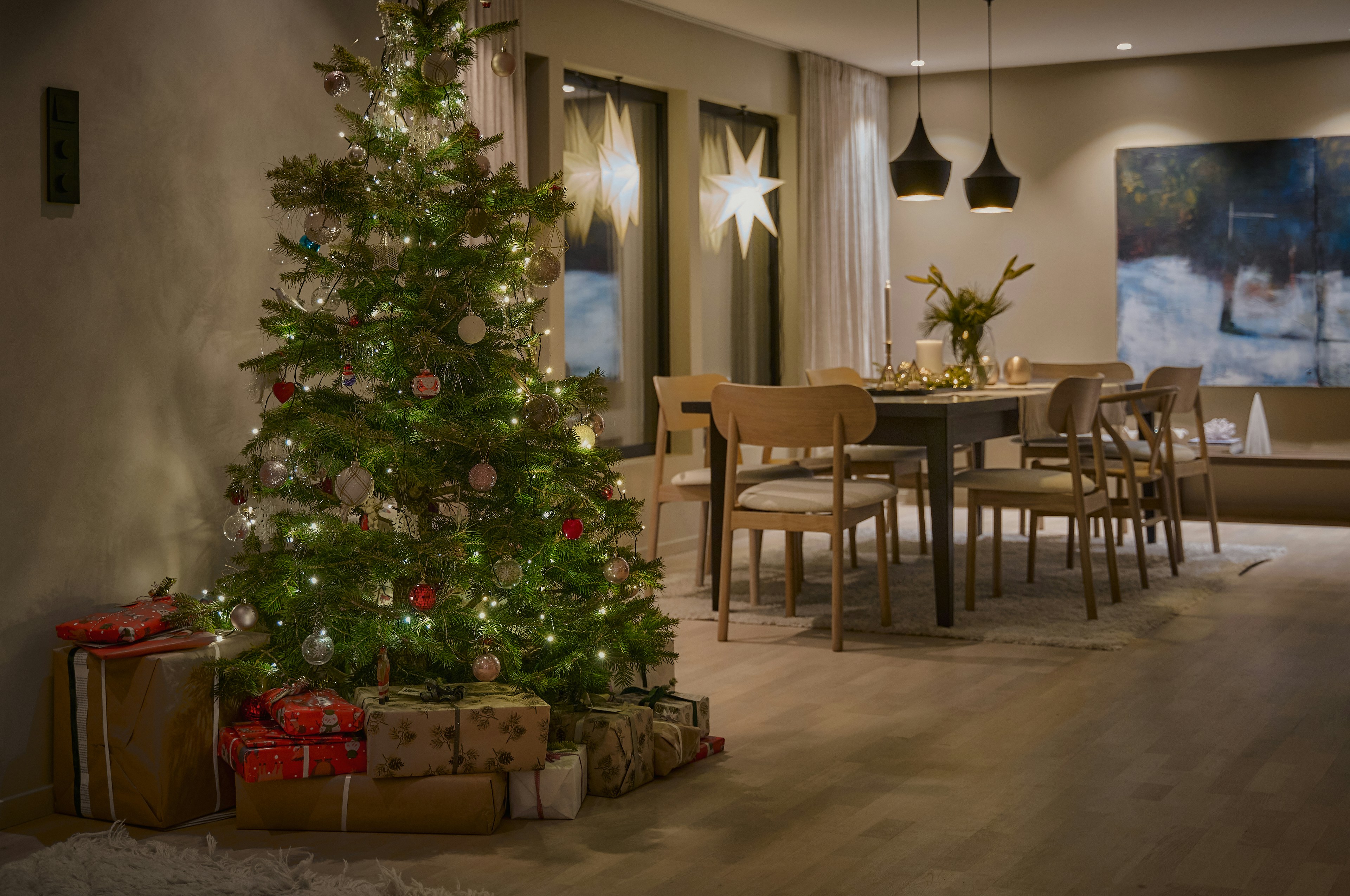 a decorated christmas tree in a living room