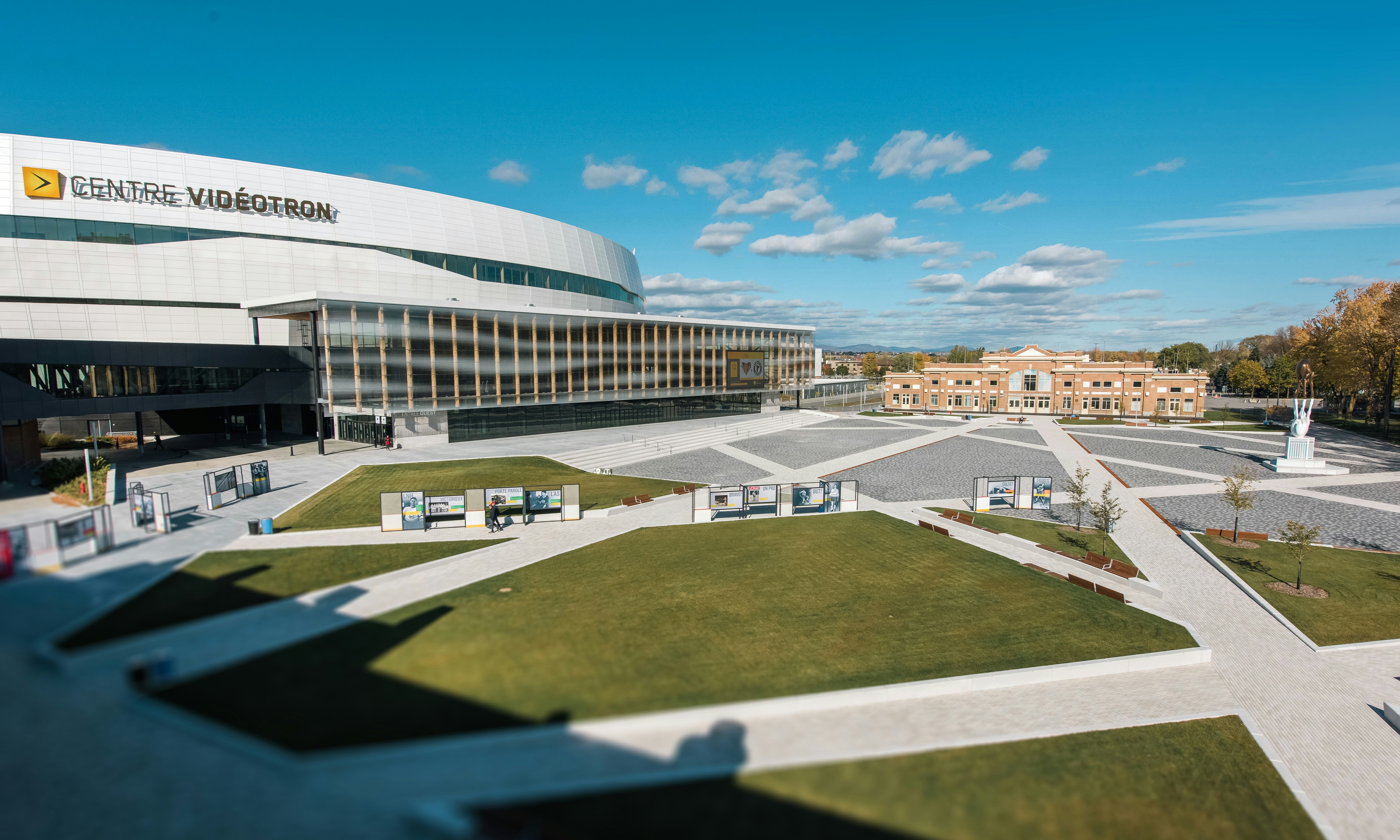 an aerial view of a building with a green roof