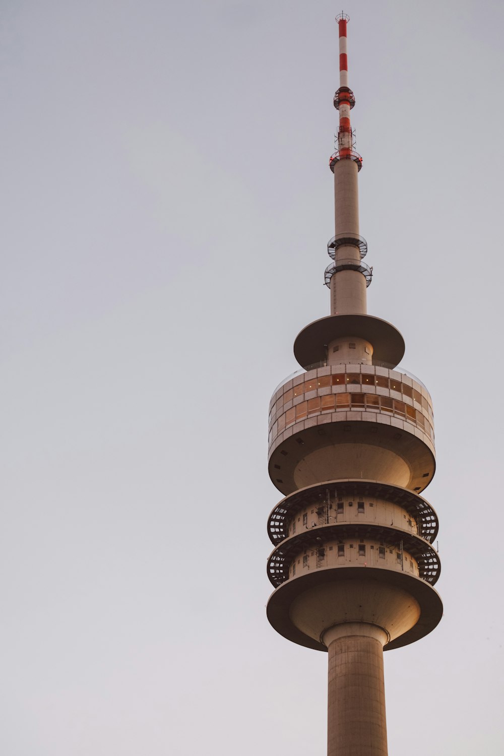 a tall tower with a clock on the top of it