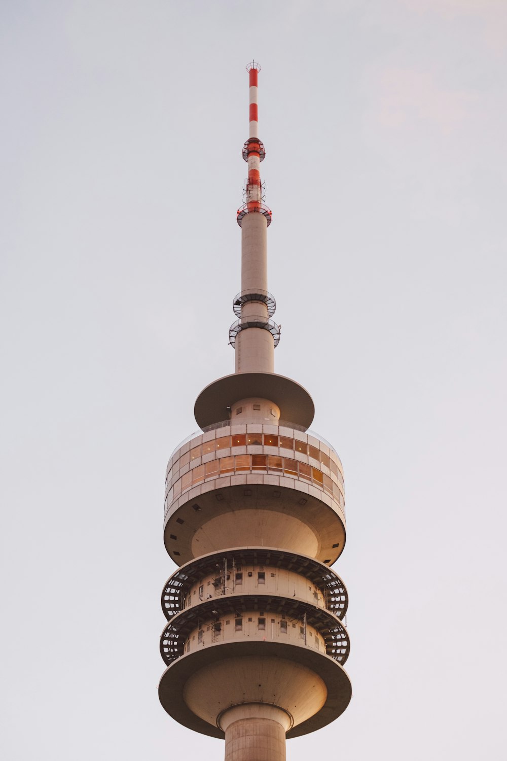 a tall tower with a clock on the top of it