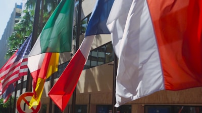 An official UAE government building with flags fluttering in the breeze.