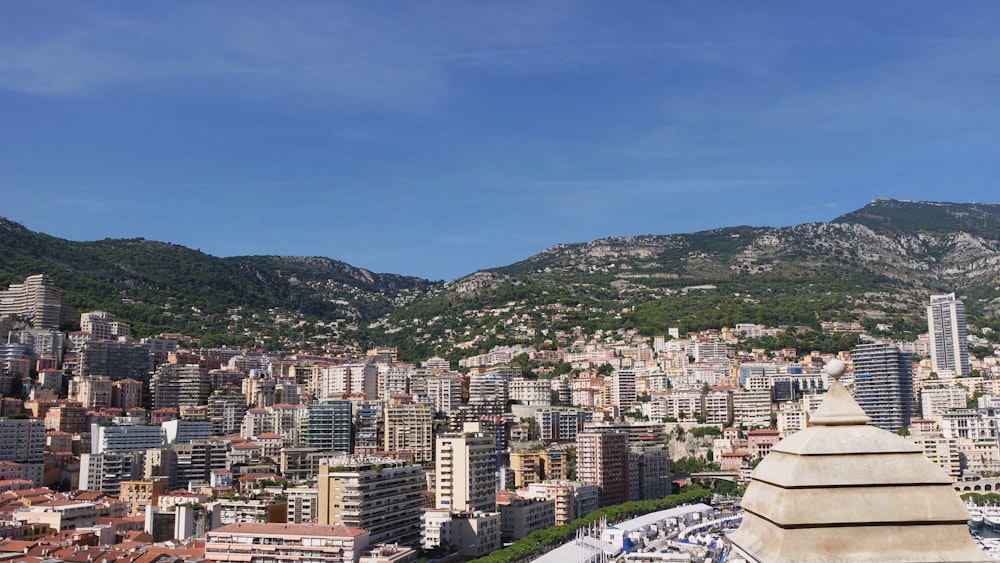 a view of a city with mountains in the background