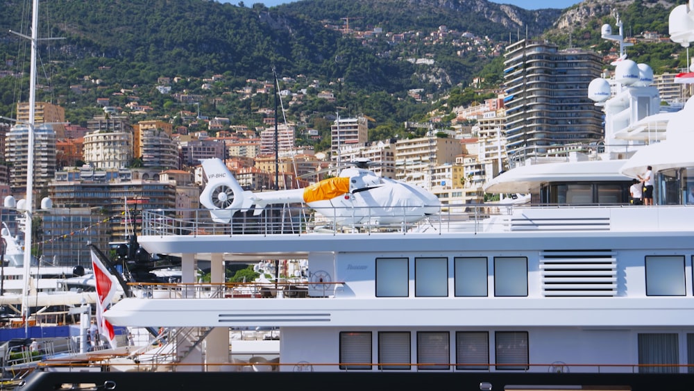 a large white boat docked in a harbor