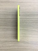 Side angle of a slim smartphone showing its buttons and textured back