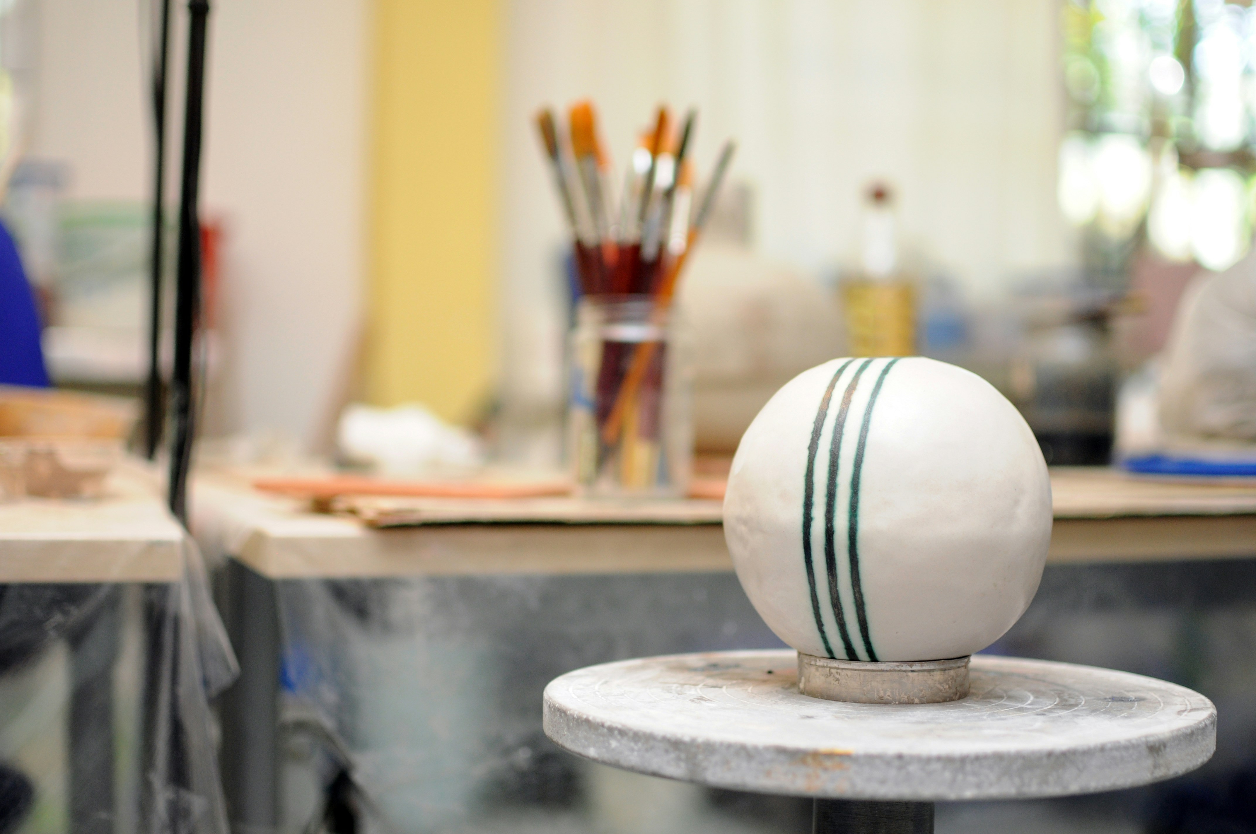 a white ball sitting on top of a table