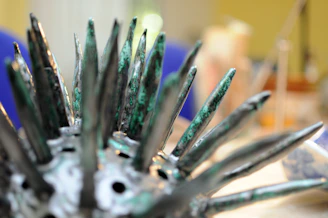 A close-up of a striking modern sculpture featured in a past gallery show.