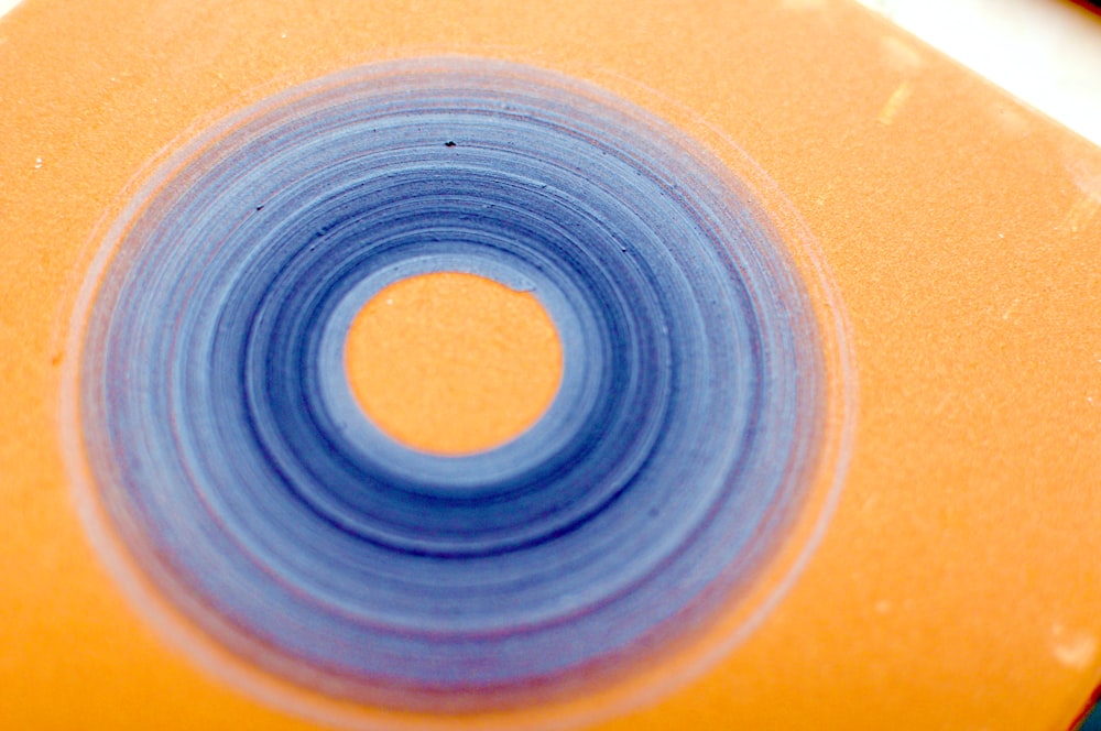 a close up of a yellow and blue object