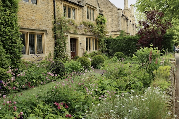 A cozy house with a well-maintained garden, showcasing a welcoming entrance and ample outdoor space.