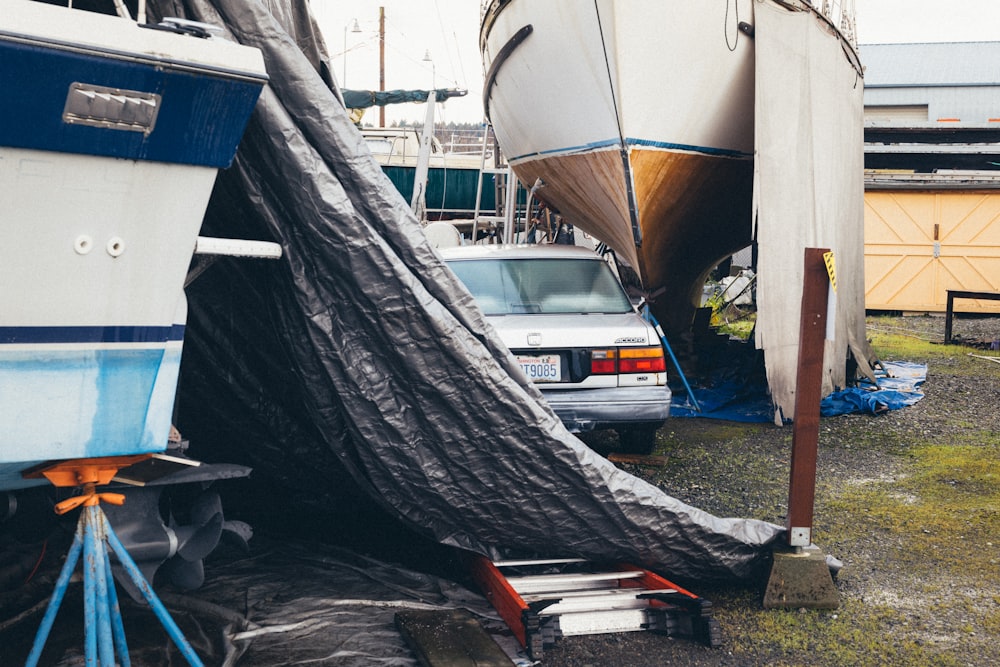 a couple of boats sitting next to each other