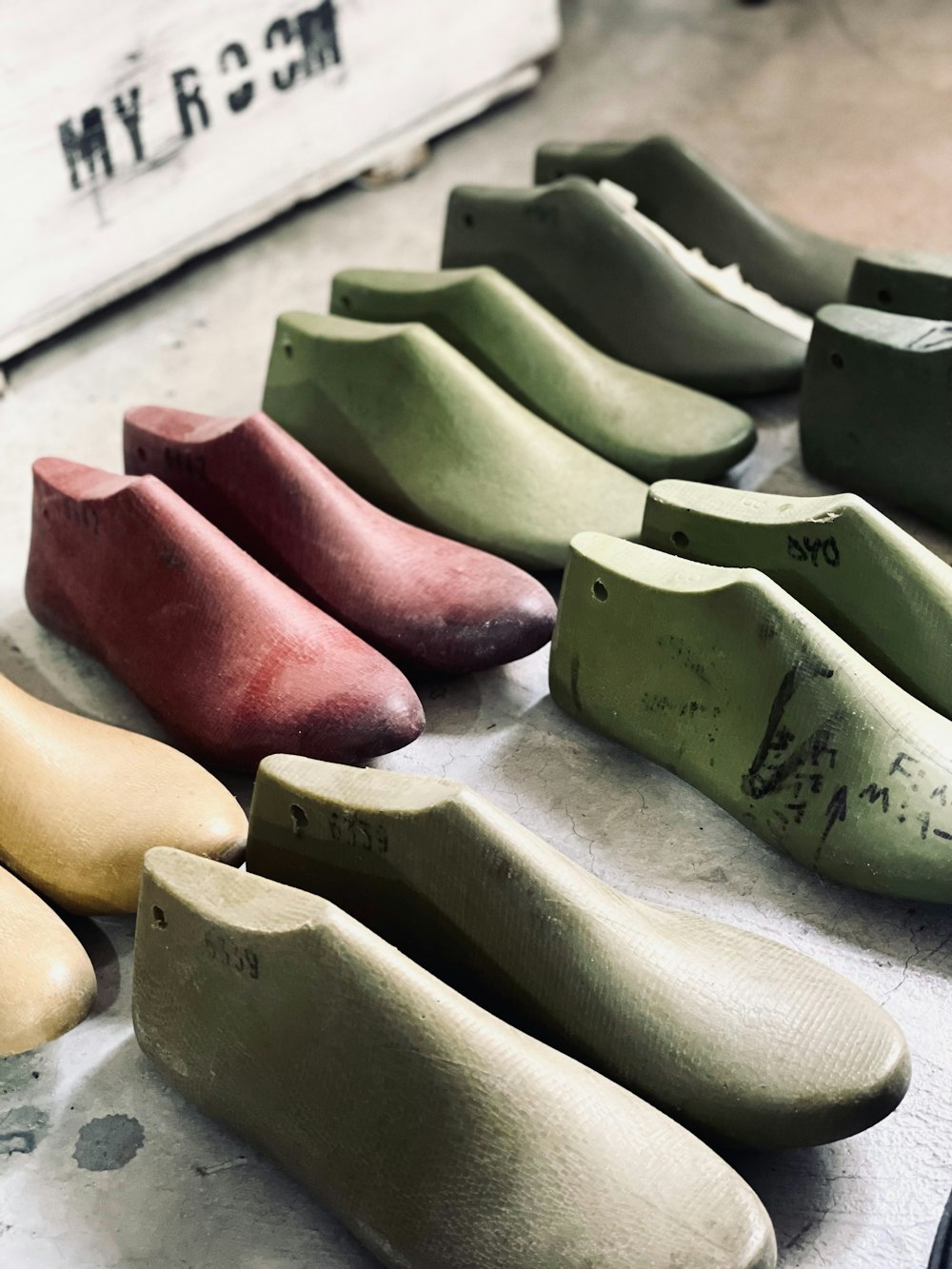 a group of shoes sitting on top of a table