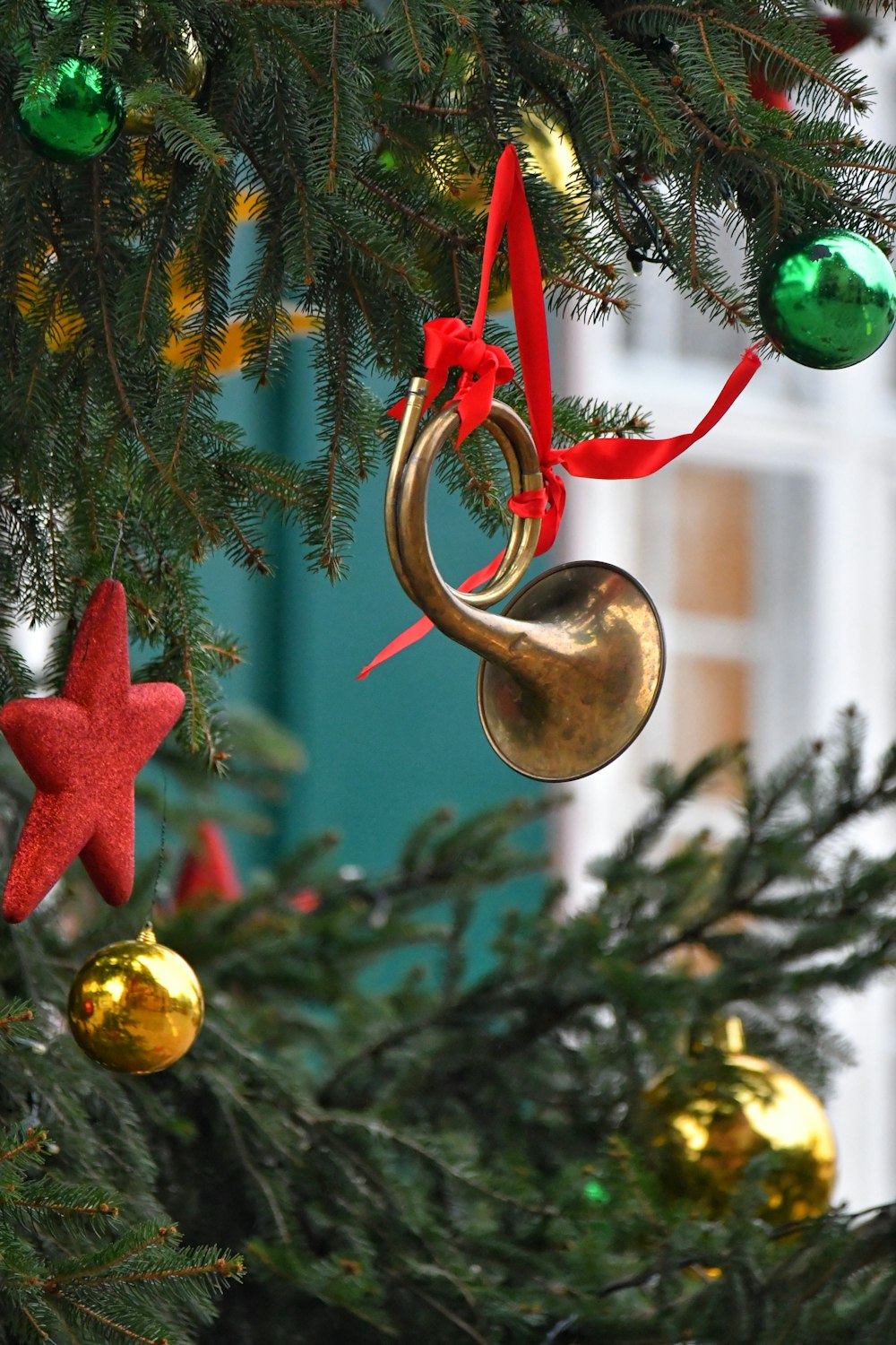 a christmas tree with ornaments hanging from it