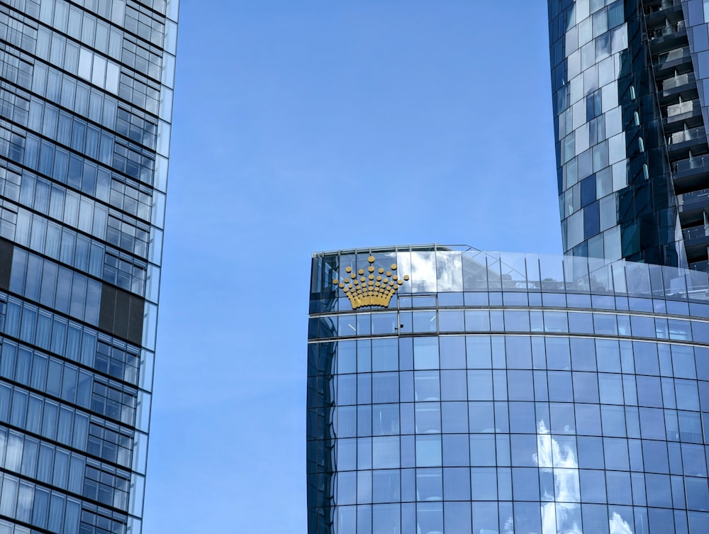 a tall building with a crown on top of it