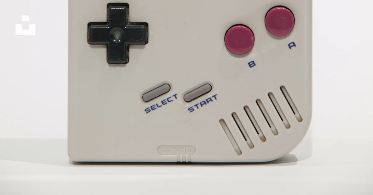 An old nintendo game boy with a gameboy on it photo – Free Grey Image ...