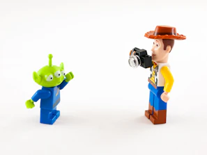 A funny scene of a space tourist trying to take a selfie with a confused alien