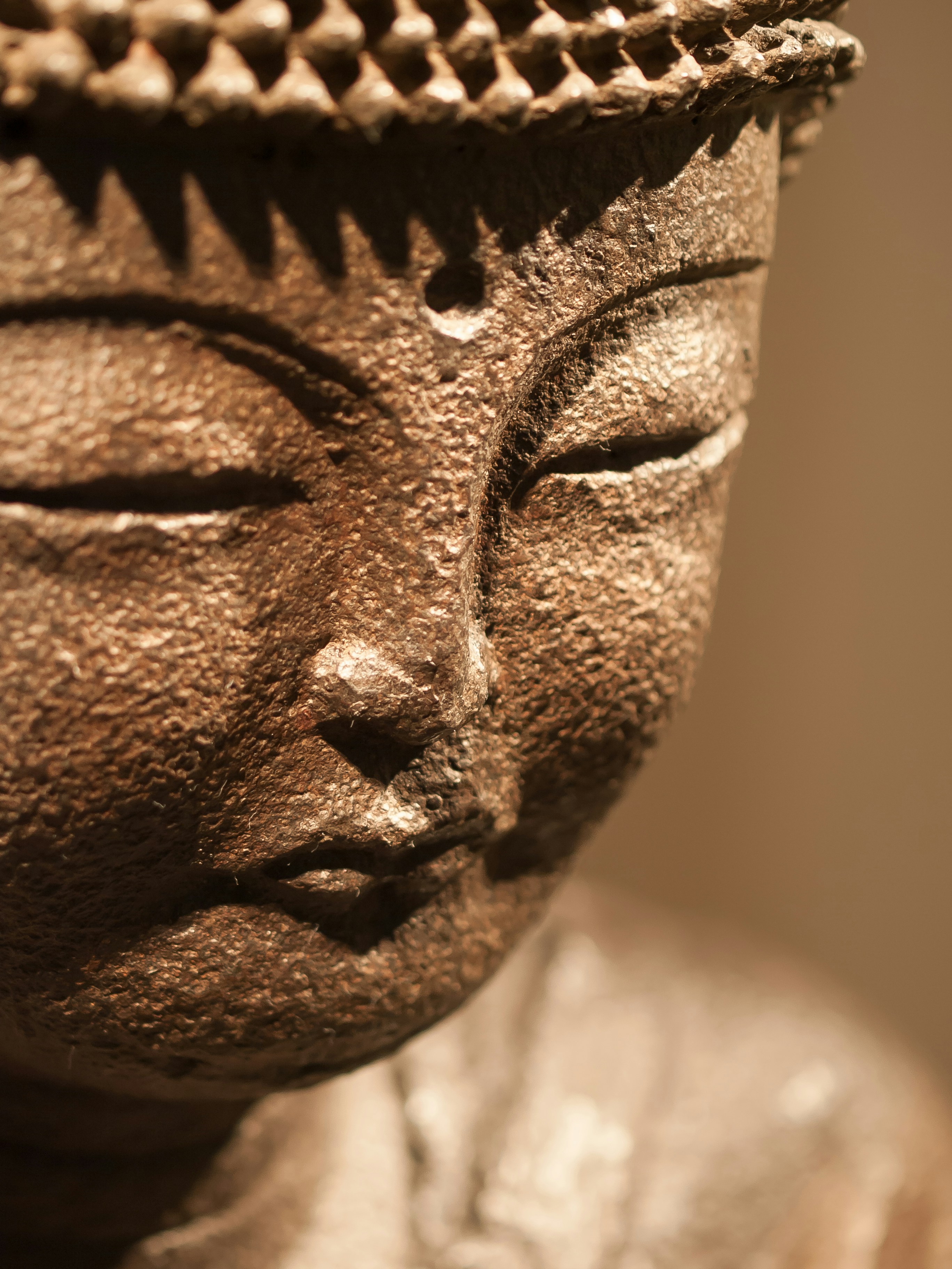 A close-up of a statue of Buddha