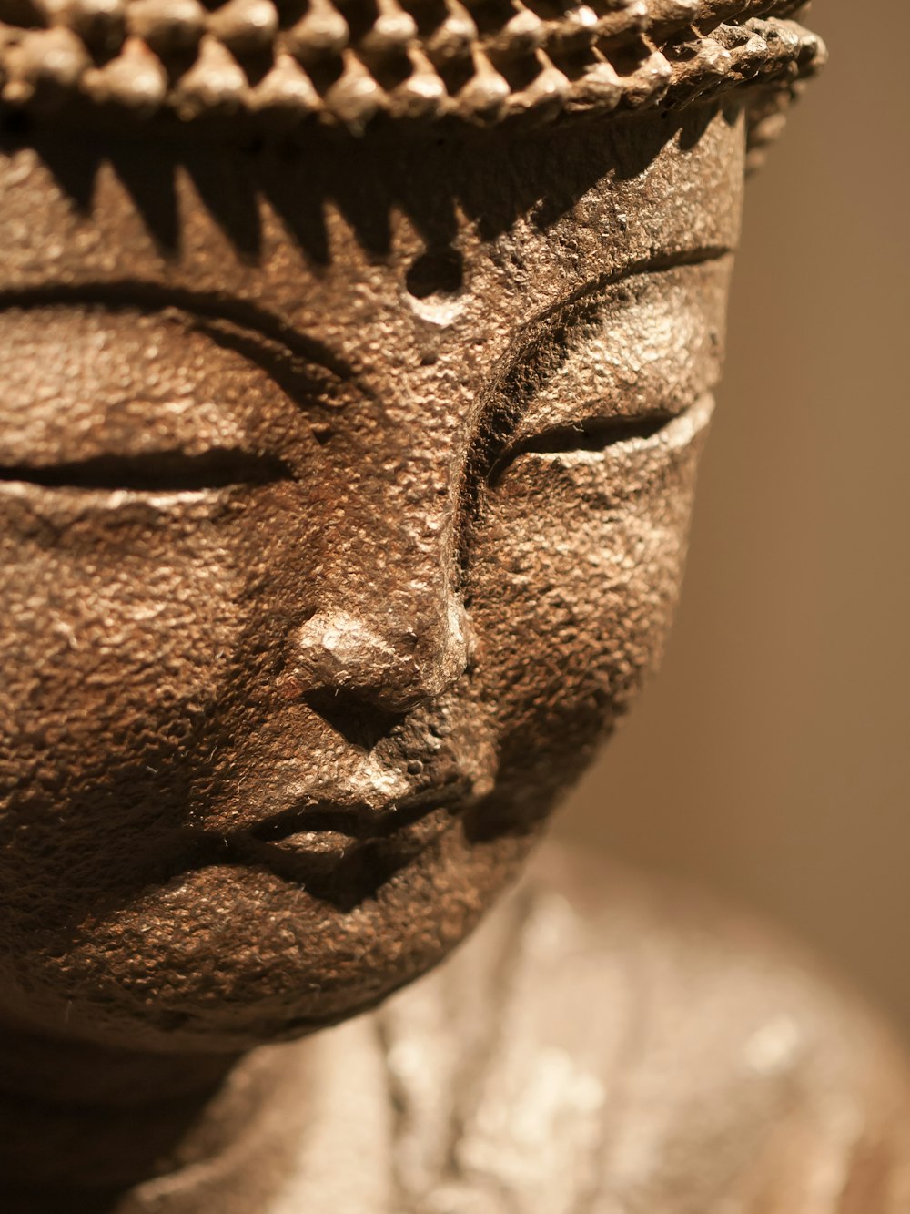 a close up of a statue of a buddha