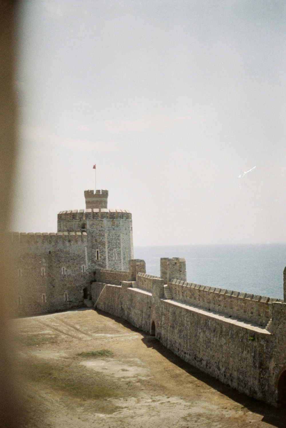 a view of a castle from the top of a hill