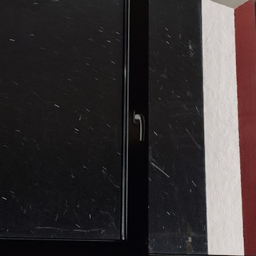 Close-up of a sleek white PVC window frame