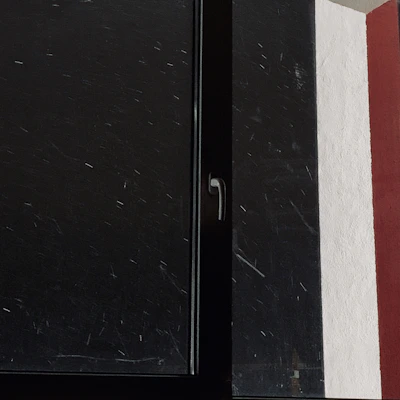 Close-up of aluminum window frame with sleek white finish