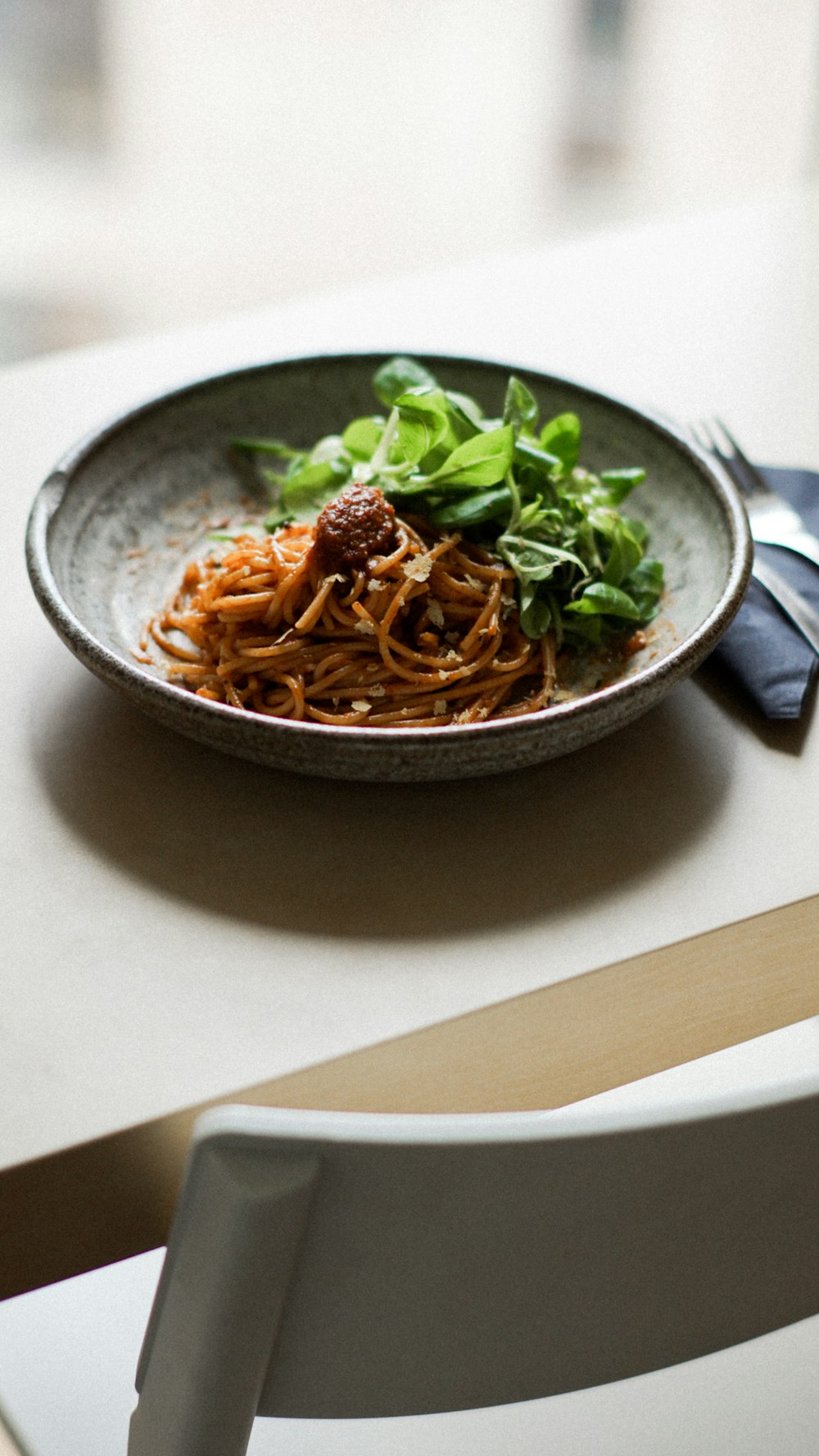 a plate of food sitting on top of a table