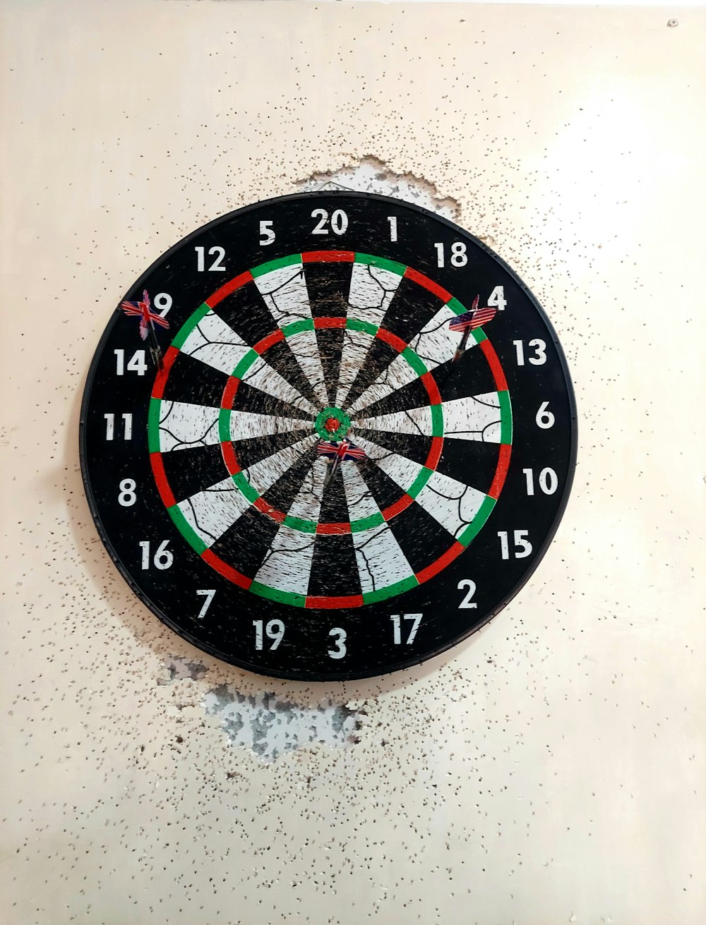 a close up of a dart on a wall