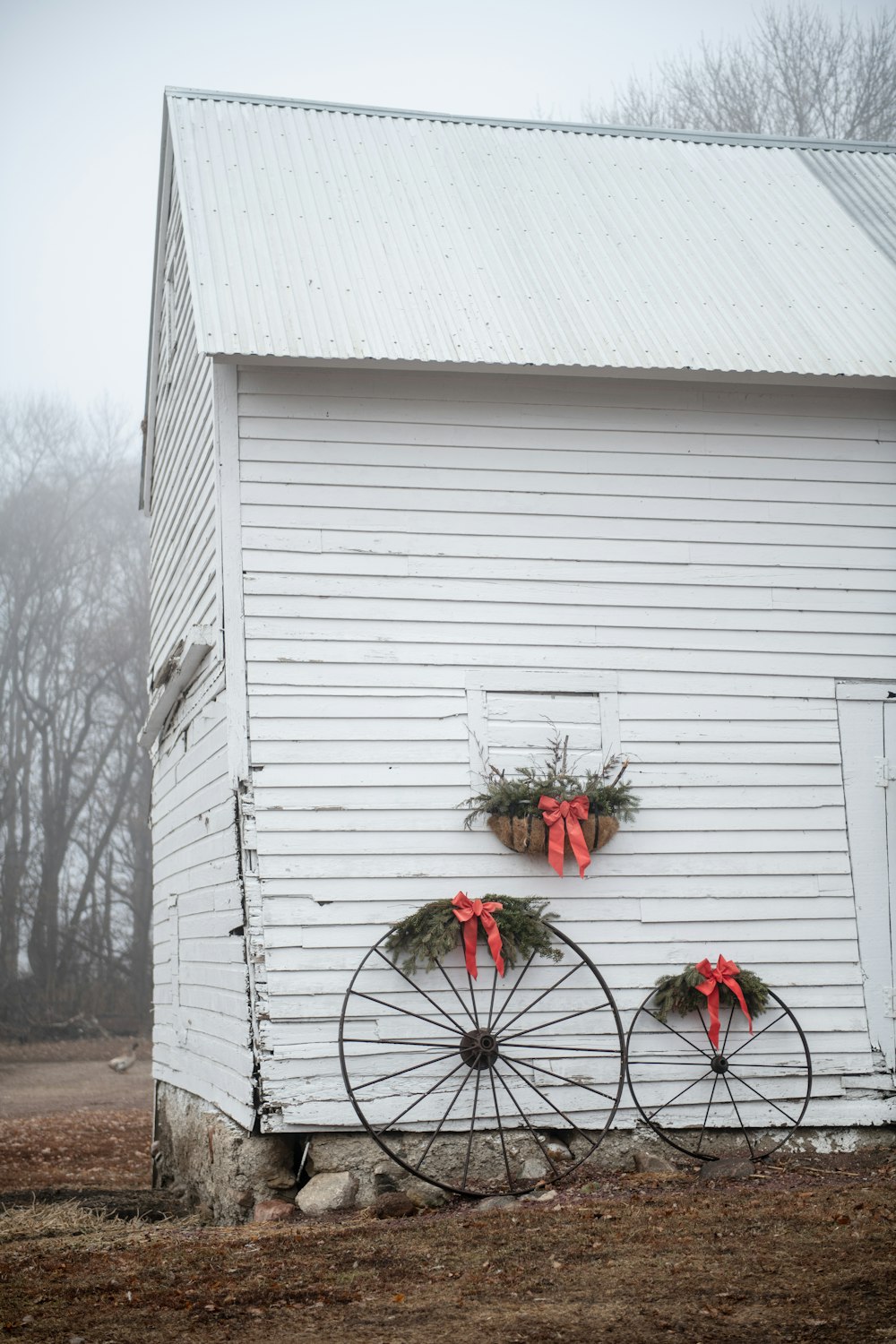 a white building with a wreath on the front of it