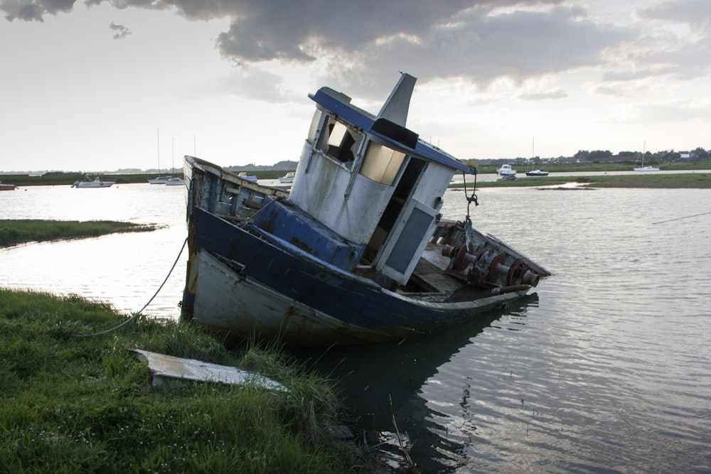 a boat sitting on top of a body of water