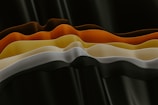 Abstract image of layered sound waves in vibrant colors.