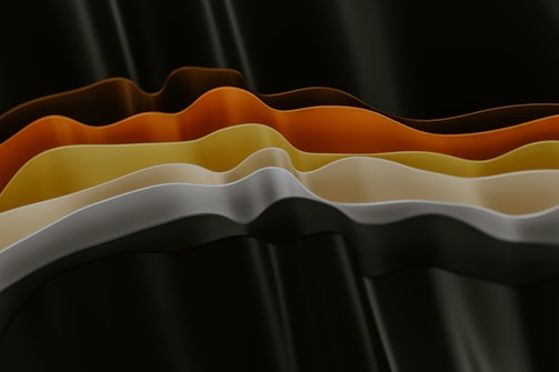 Abstract image of layered sound waves in vibrant colors.