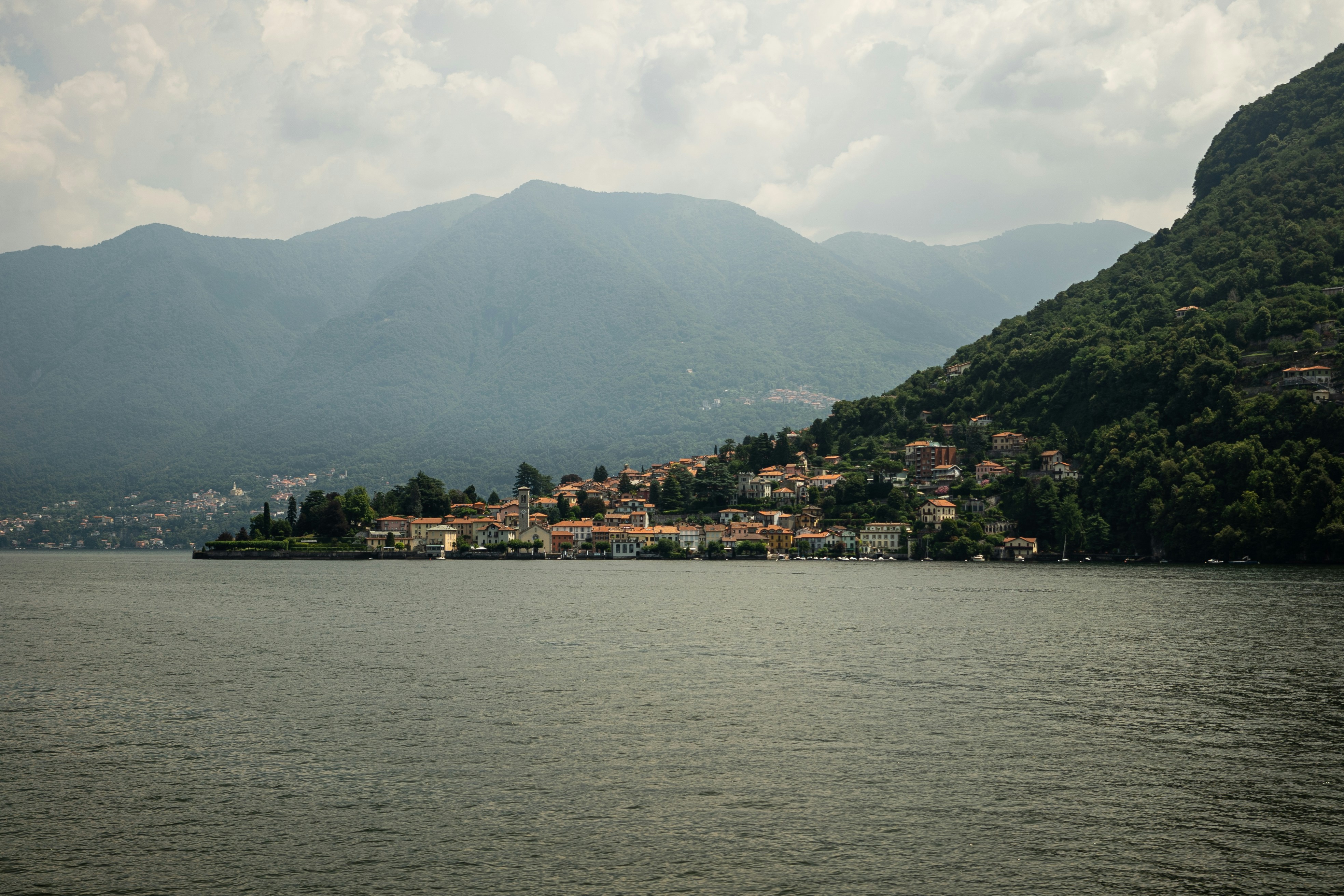 A body of water with a small town on top of it