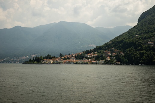 a body of water with a small town on top of it
