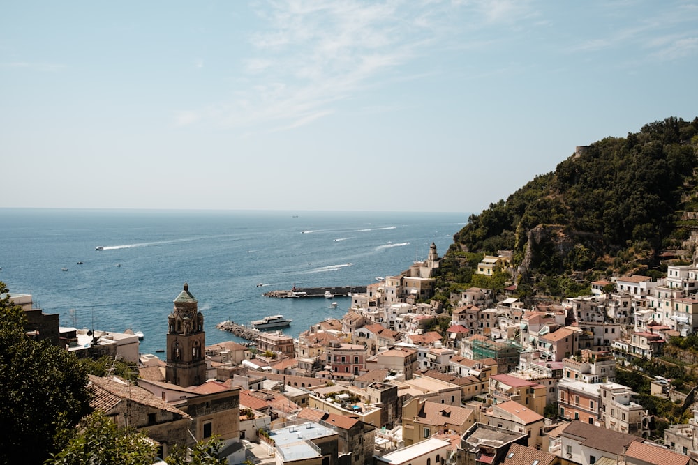 a view of a small town by the ocean