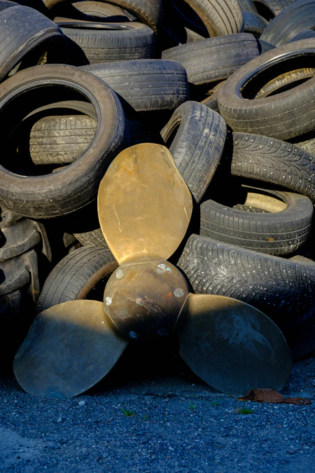 a pile of old tires sitting next to each other