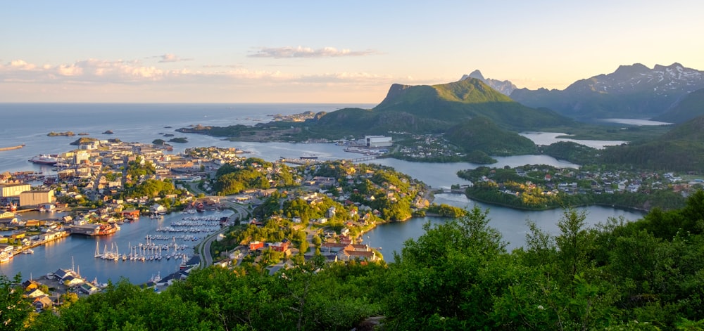 a scenic view of a small town and a harbor