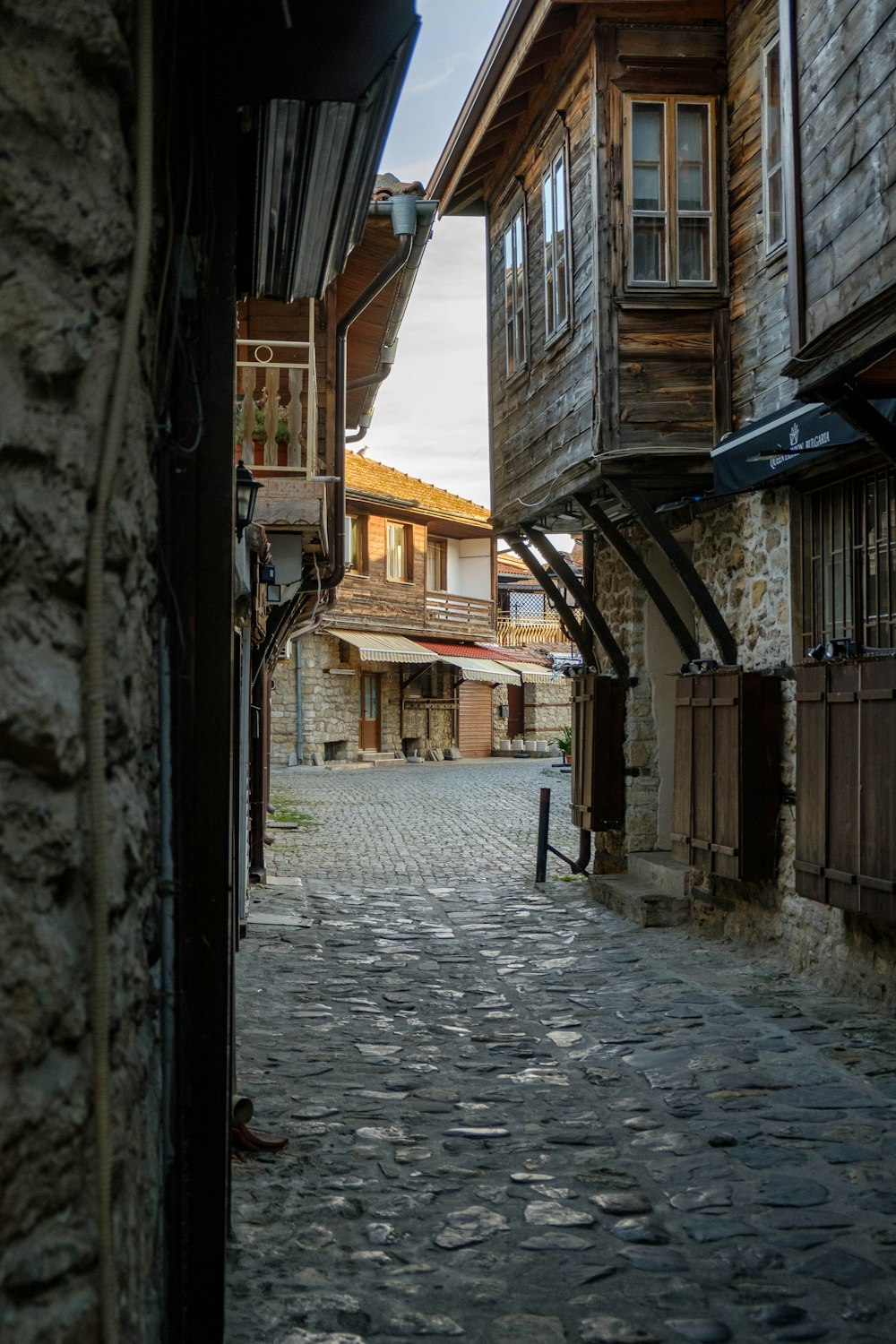 a cobblestone street in a small village