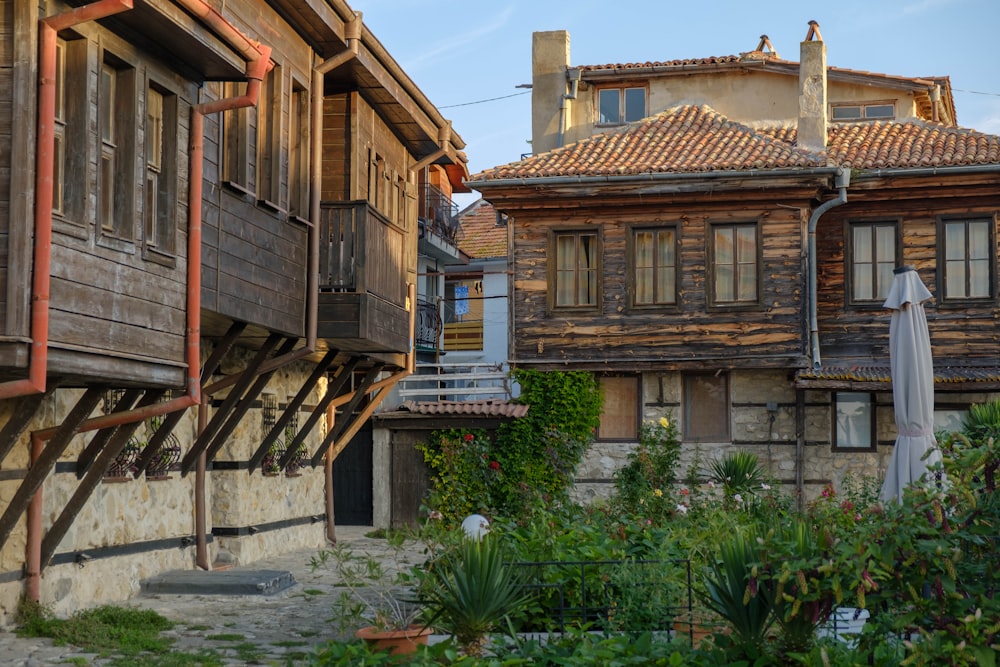 a row of wooden buildings next to each other