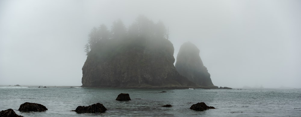 a large body of water surrounded by rocks