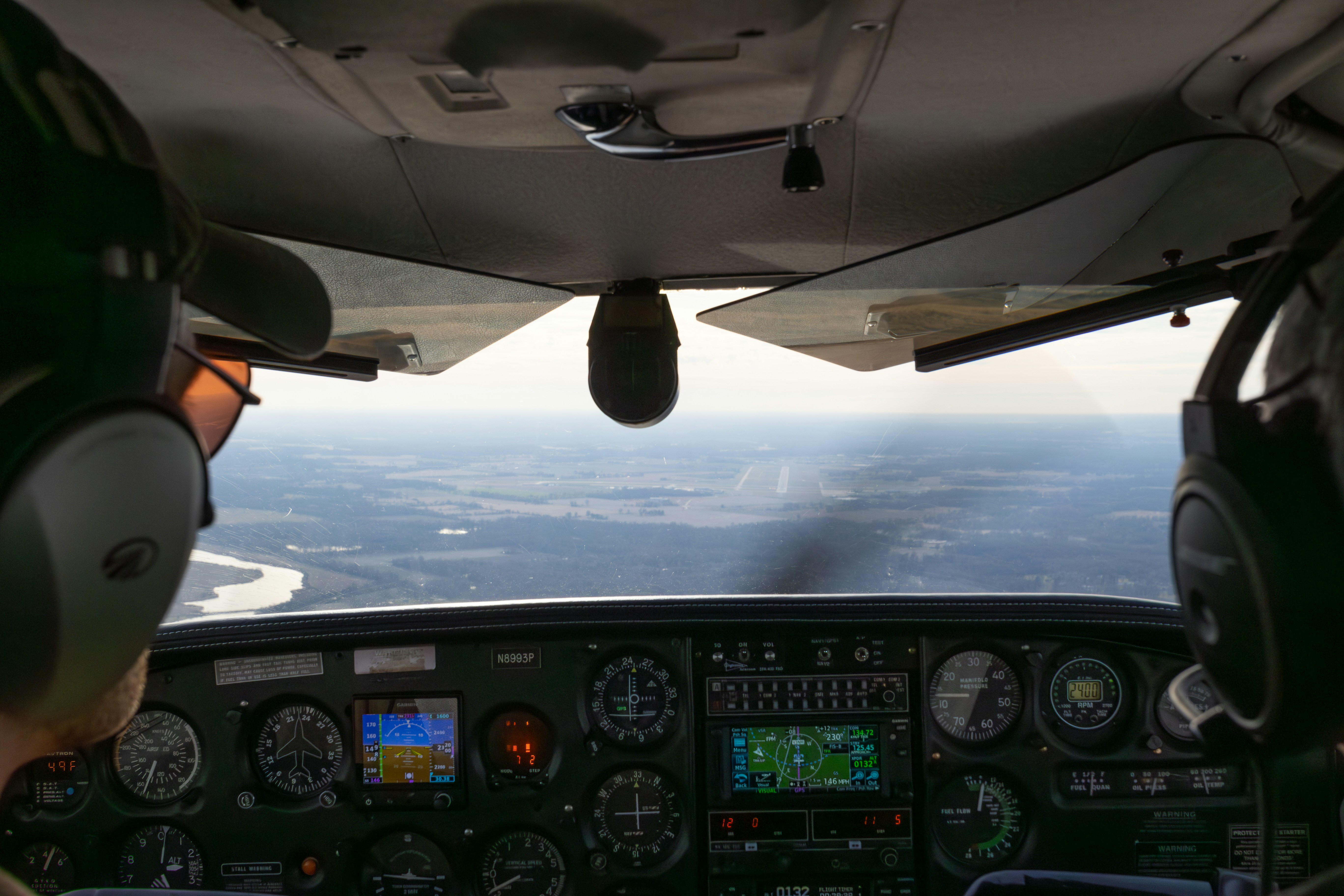 two pilots in the cockpit of an airplane