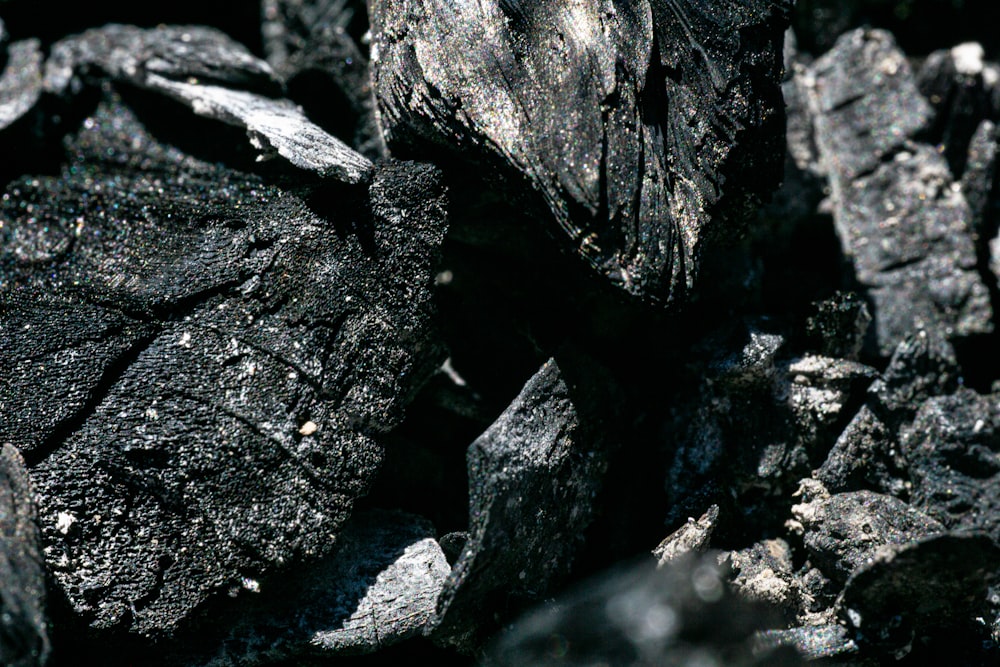 a black and white photo of rocks and dirt