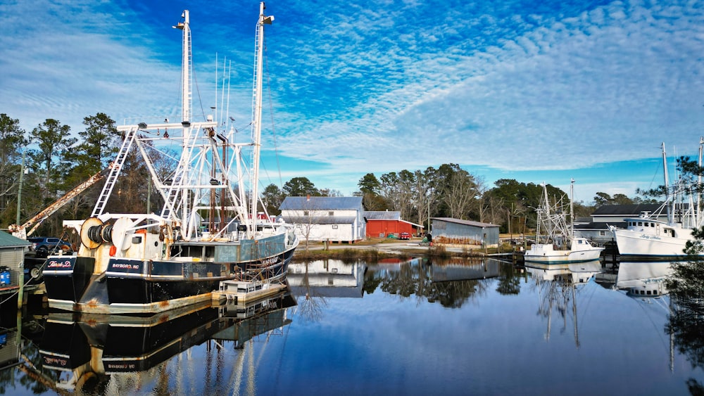 a group of boats that are sitting in the water