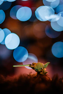 Close-up of a semi-realistic Funko Pop style digital collectible from the Star Wars series glowing subtly against a dark background.
