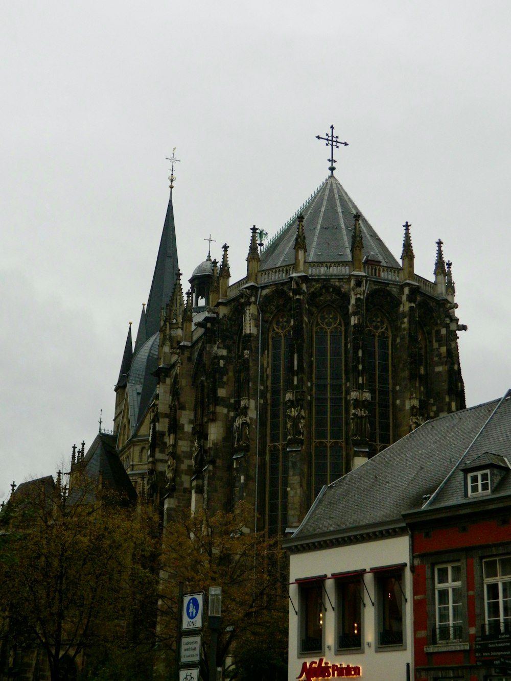 a large cathedral with a clock on the front of it