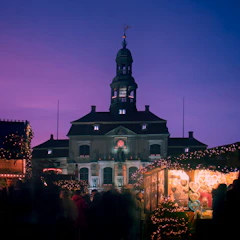 Festive Christmas markets glowing warmly in Prague’s historic old town.